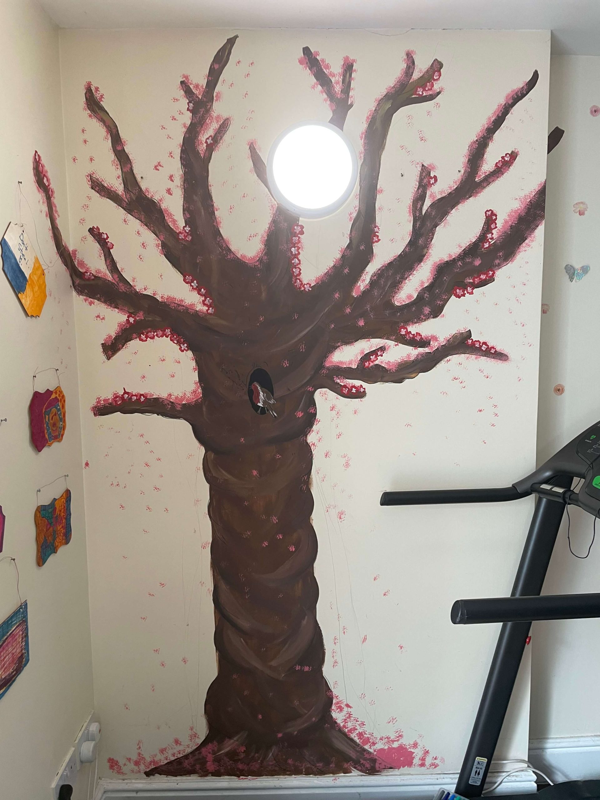 painting of a wellness tree with pink blossoms 